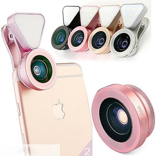 Rose gold clip-on wide angle and macro lens on a phone