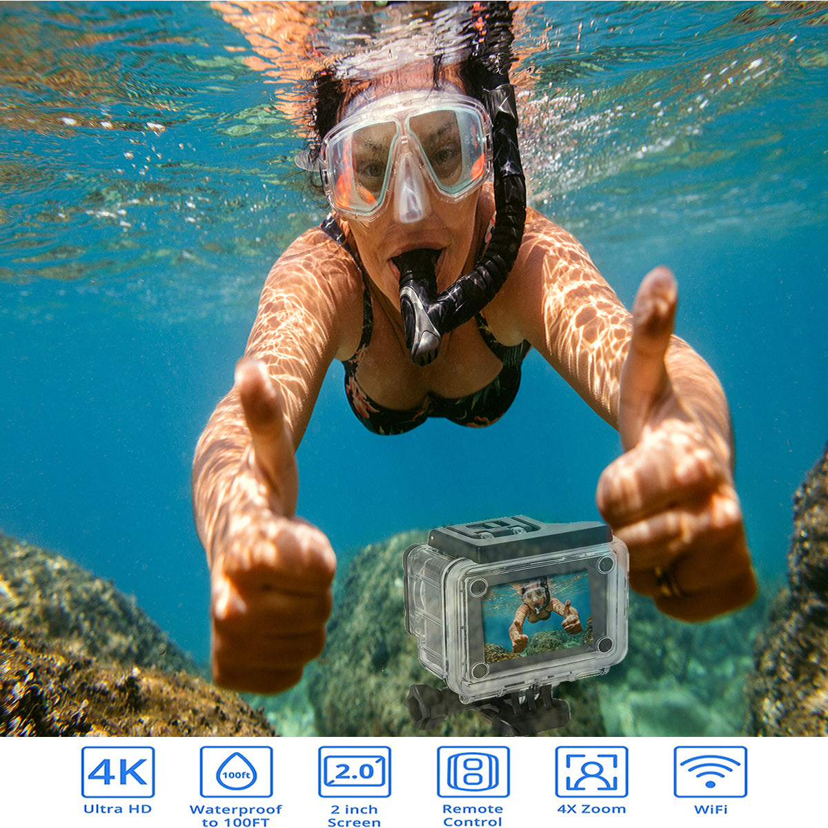 Snorkeler giving thumbs up with the action camera underwater
