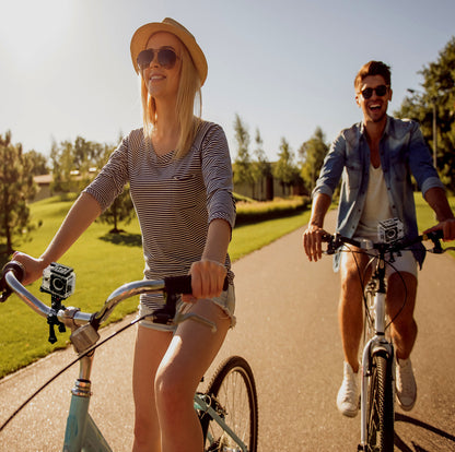 Action camera mounted on a bike, filming a couple cycling