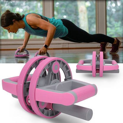 Woman doing push-ups with the pink ab wheel set