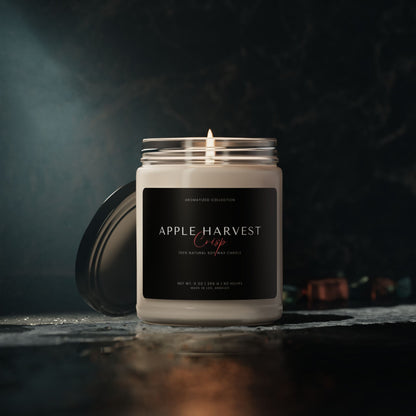 Lit Apple Harvest Crisp candle on a dark background