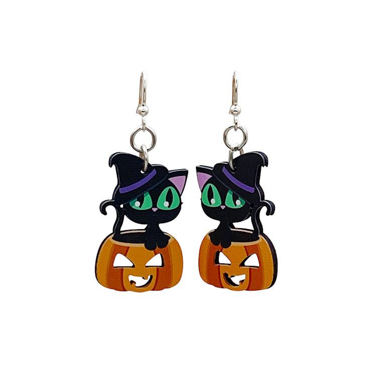 Black cat sitting on jack-o-lantern dangle earrings on white