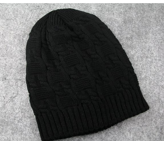 Black cable knit slouchy beanie laid flat