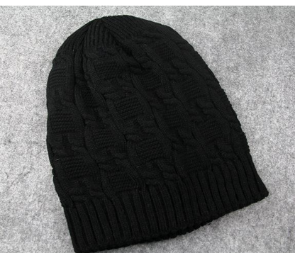 Black cable knit slouchy beanie laid flat