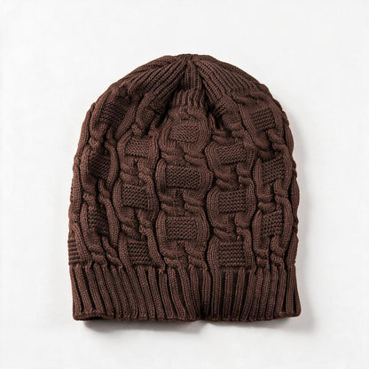 Cable knit slouchy beanie in coffee brown on a white background