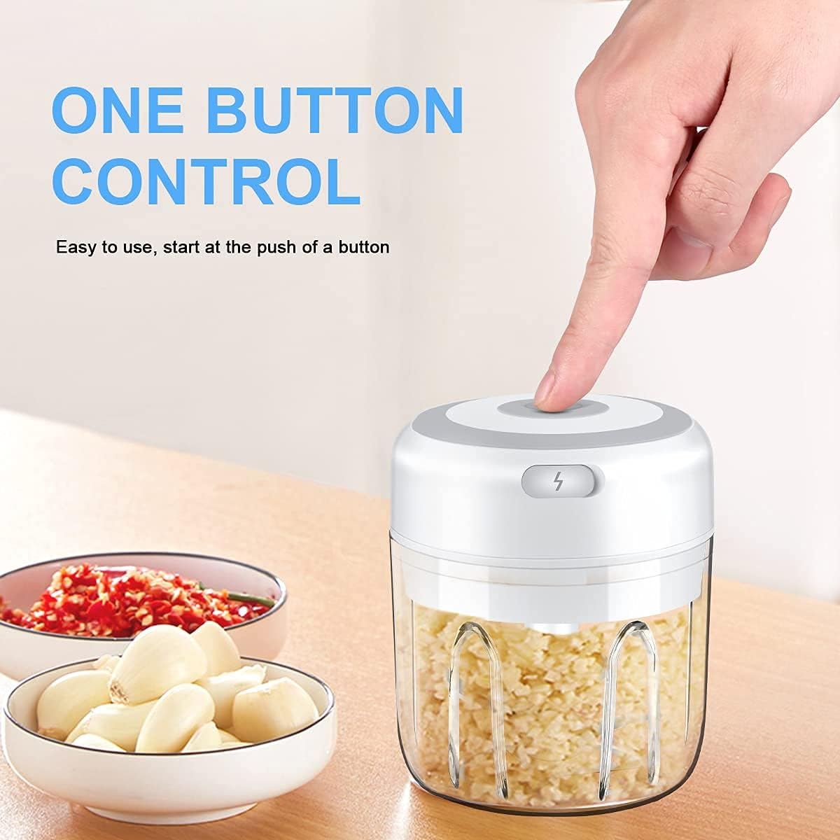 One-button garlic chopper mincing garlic