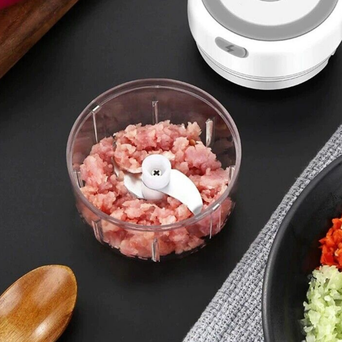Garlic chopper with minced meat in the bowl