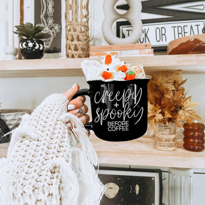 Creepy and Spooky mug filled with candy corn treats on a Halloween shelf