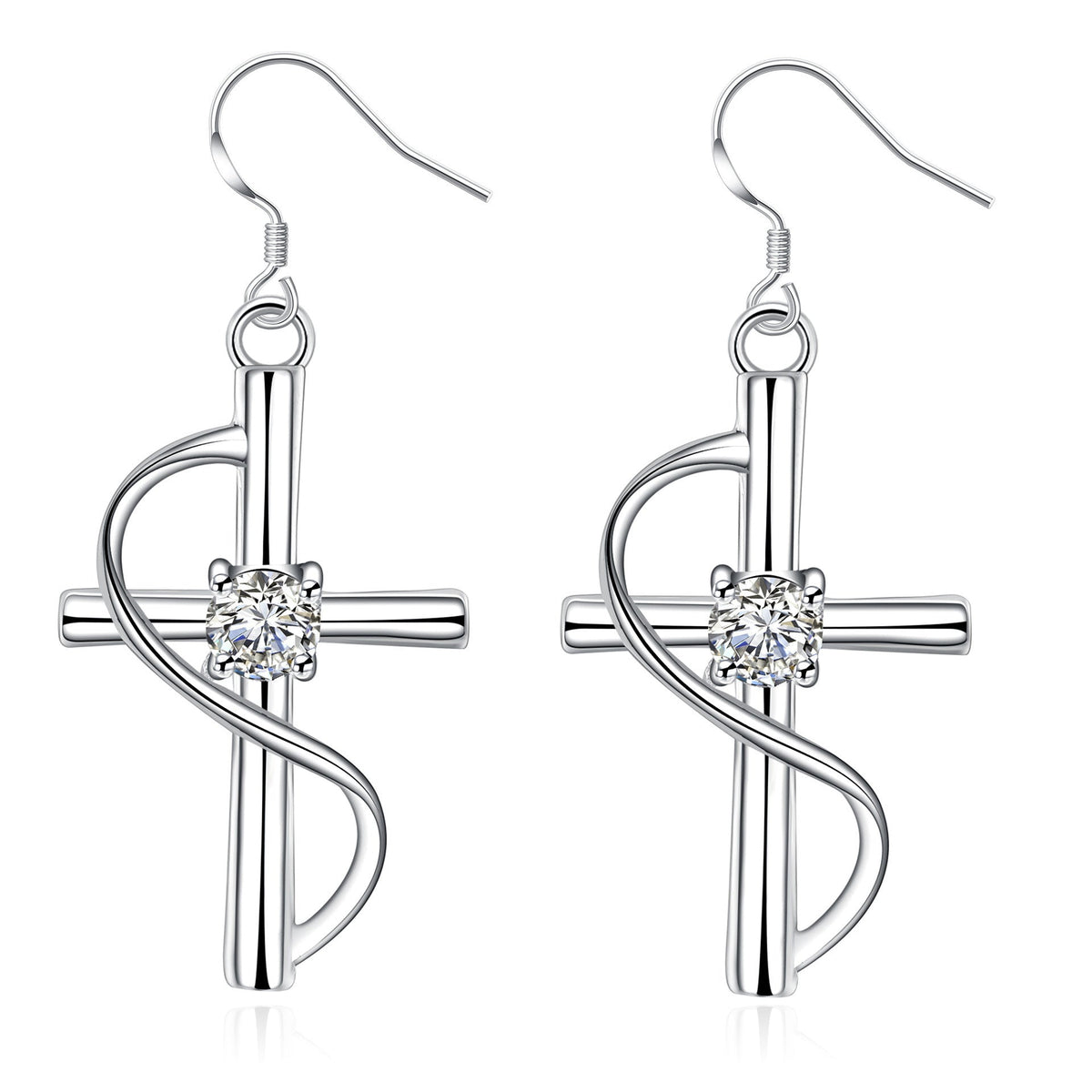 Silver cross drop earrings with a swirl and crystal center on white