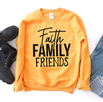 Gold Faith Family Friends sweatshirt flat lay with jeans and boots