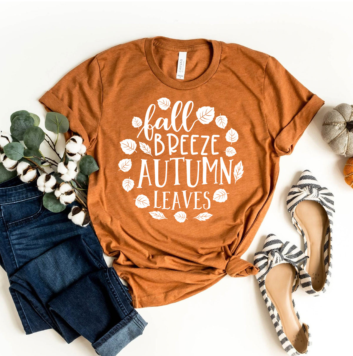 Rust Fall Breeze Autumn Leaves t-shirt flat lay with jeans and flats