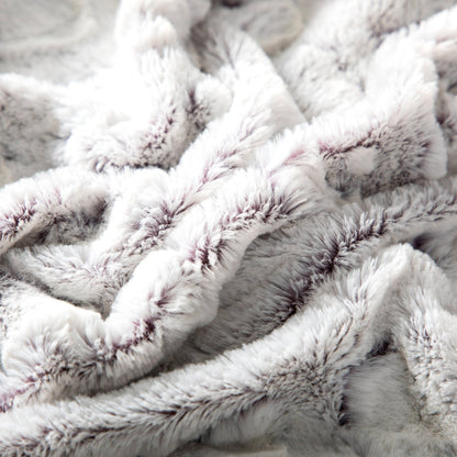 Close-up of the soft white faux fur with purple tips