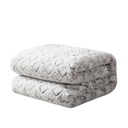 Faux fur sherpa throw blanket folded on white