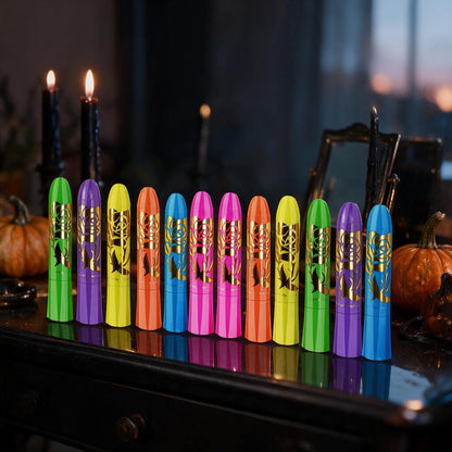 Twelve neon glow face paint crayons lined up on a Halloween vanity