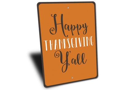 Orange Happy Thanksgiving Y'all sign with rounded corners, angled view