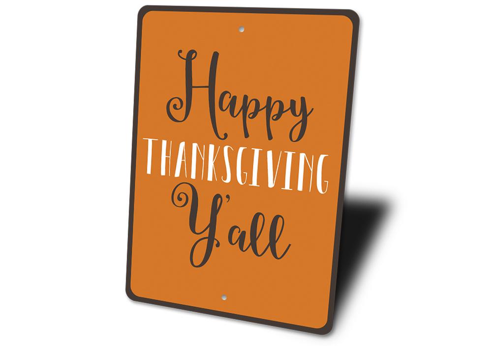 Happy Thanksgiving Y'all orange sign with brown script and white lettering, side angle