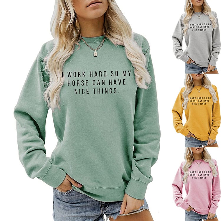 I Work Hard So My Horse Can Have Nice Things sweatshirt in sage green on a model, with grey, yellow and pink color options