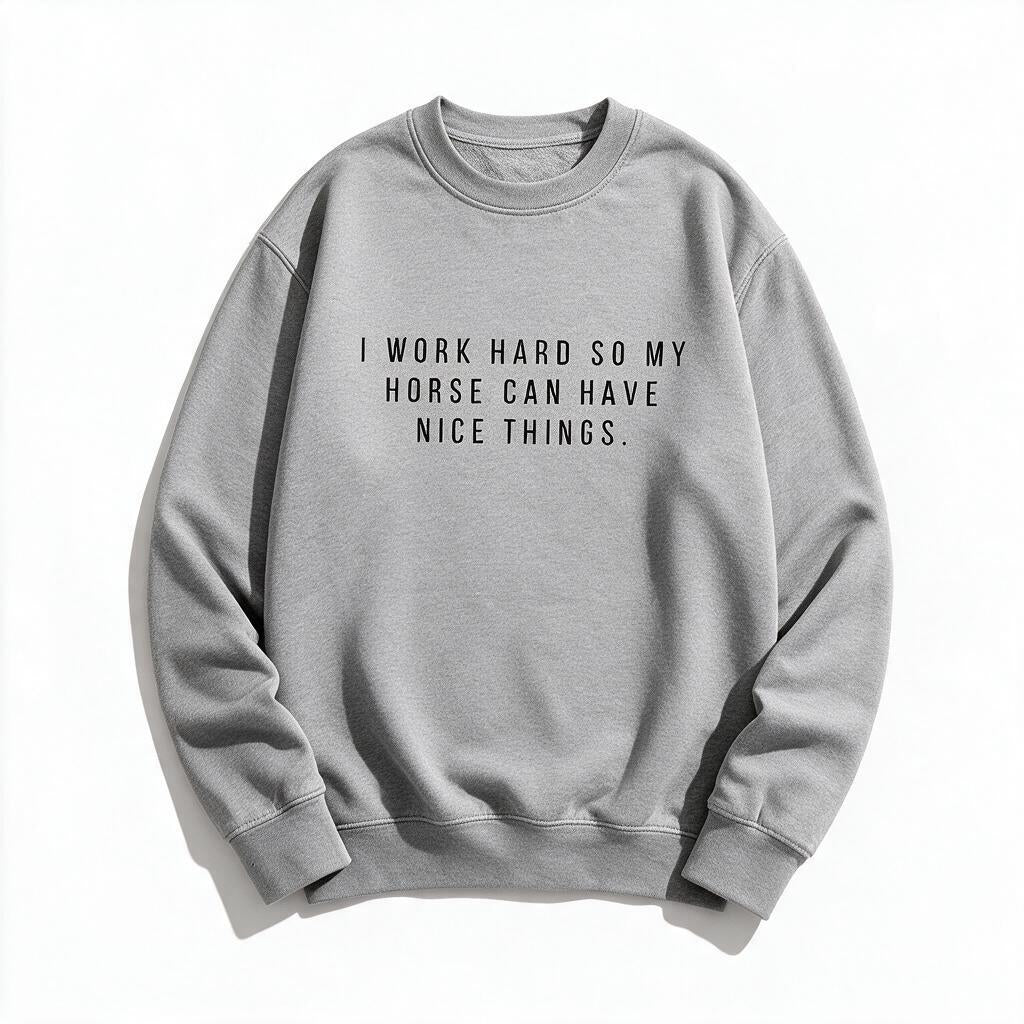 I Work Hard So My Horse Can Have Nice Things sweatshirt in heather grey, flat lay on white