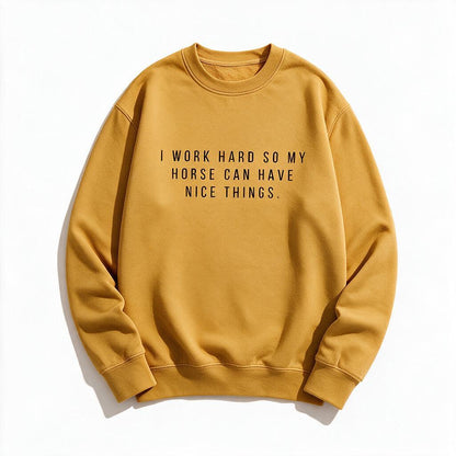 I Work Hard So My Horse Can Have Nice Things sweatshirt in mustard yellow, flat lay on white