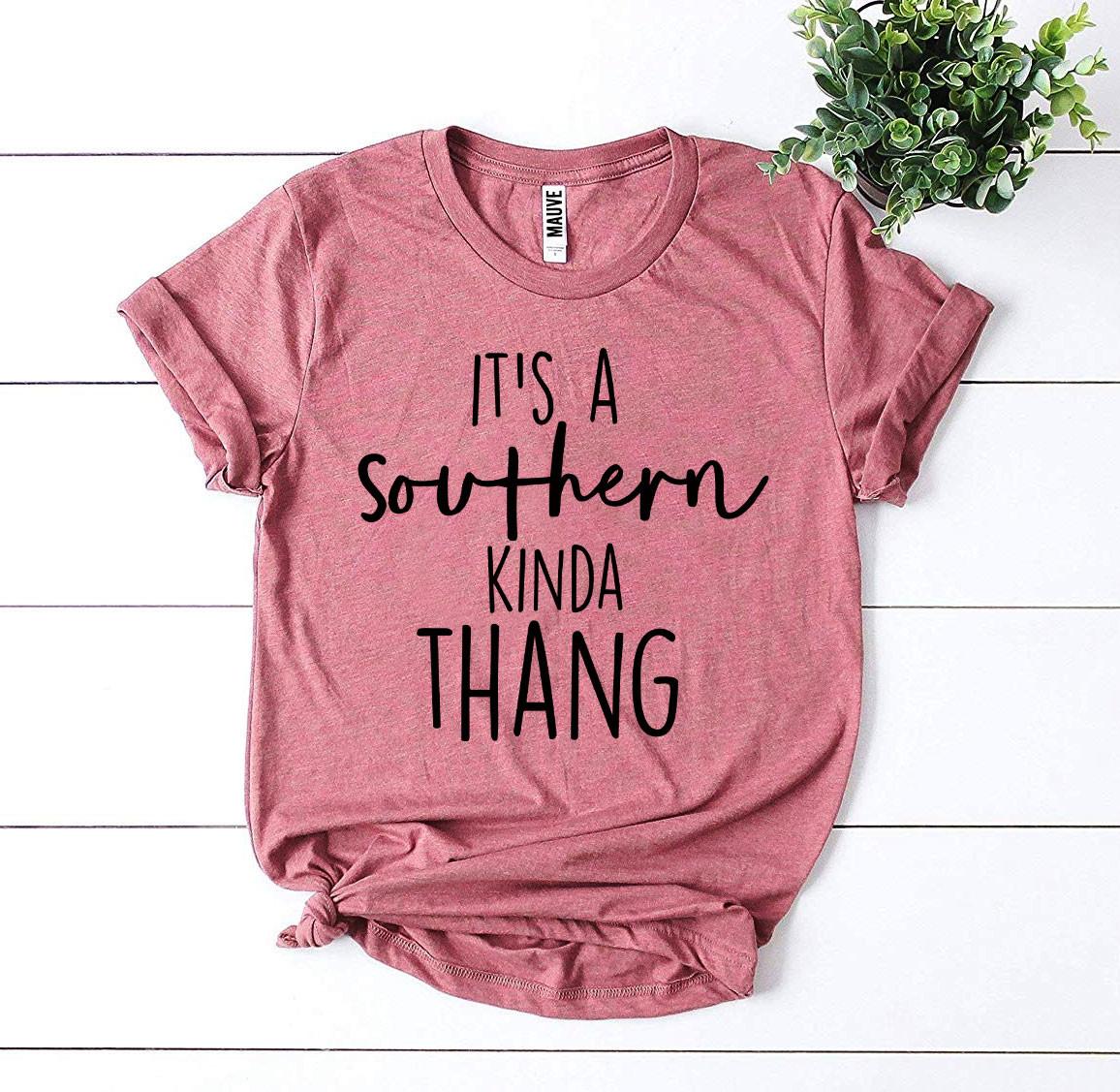 Mauve It's a Southern Kinda Thang t-shirt on white wood