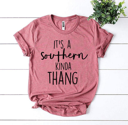 Mauve It's a Southern Kinda Thang t-shirt on white wood