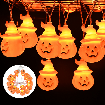 Glowing jack-o-lantern LED string lights with witch hats, coiled strand inset