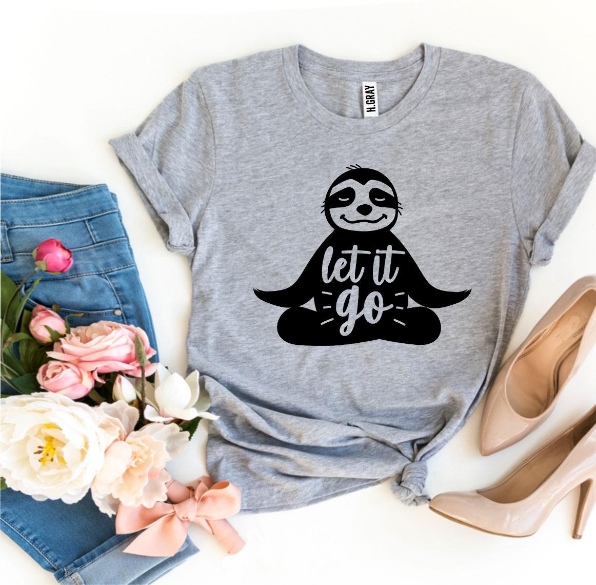 Heather gray Let It Go meditating sloth t-shirt flat lay with heels