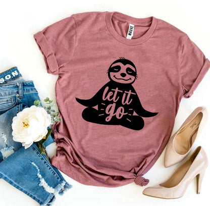 Mauve Let It Go sloth t-shirt flat lay with jeans and heels