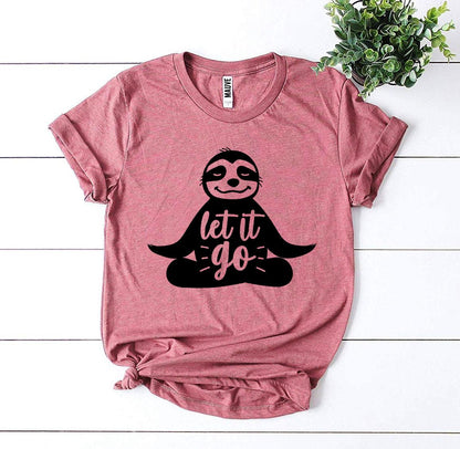 Mauve Let It Go meditating sloth t-shirt on white wood