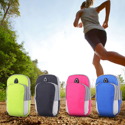 Phone armband pouches in green, black, rose red and blue on a trail with a runner