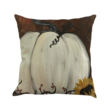Pillow cover with a painted white pumpkin and sunflower on brown