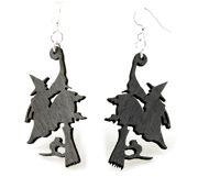 Pair of black wooden witch on broomstick dangle earrings on white