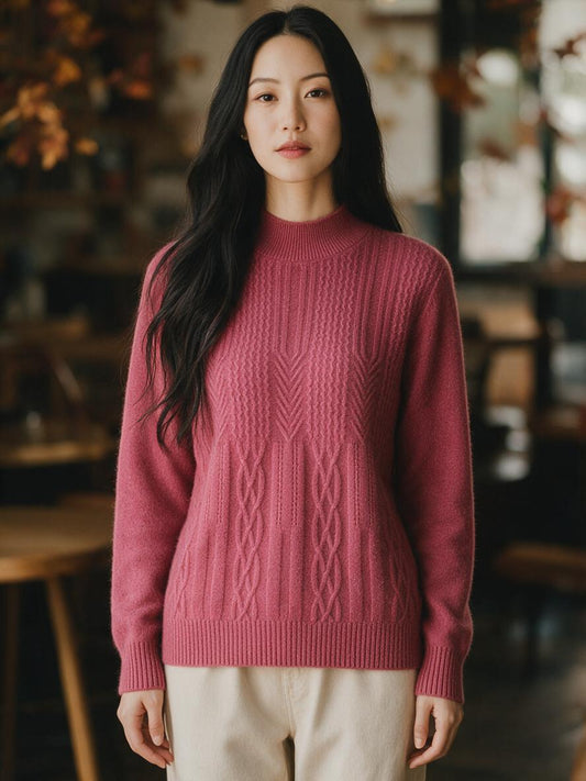 Woman wearing a cable knit mock turtleneck sweater in a cozy autumn cafe